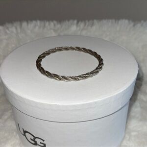 Silver rope coil bracelet handmade hand crafted in Indonesia 
Unknown designer